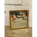A vintage bamboo wall mirror with reverse painted glass 69cm x 69cm.