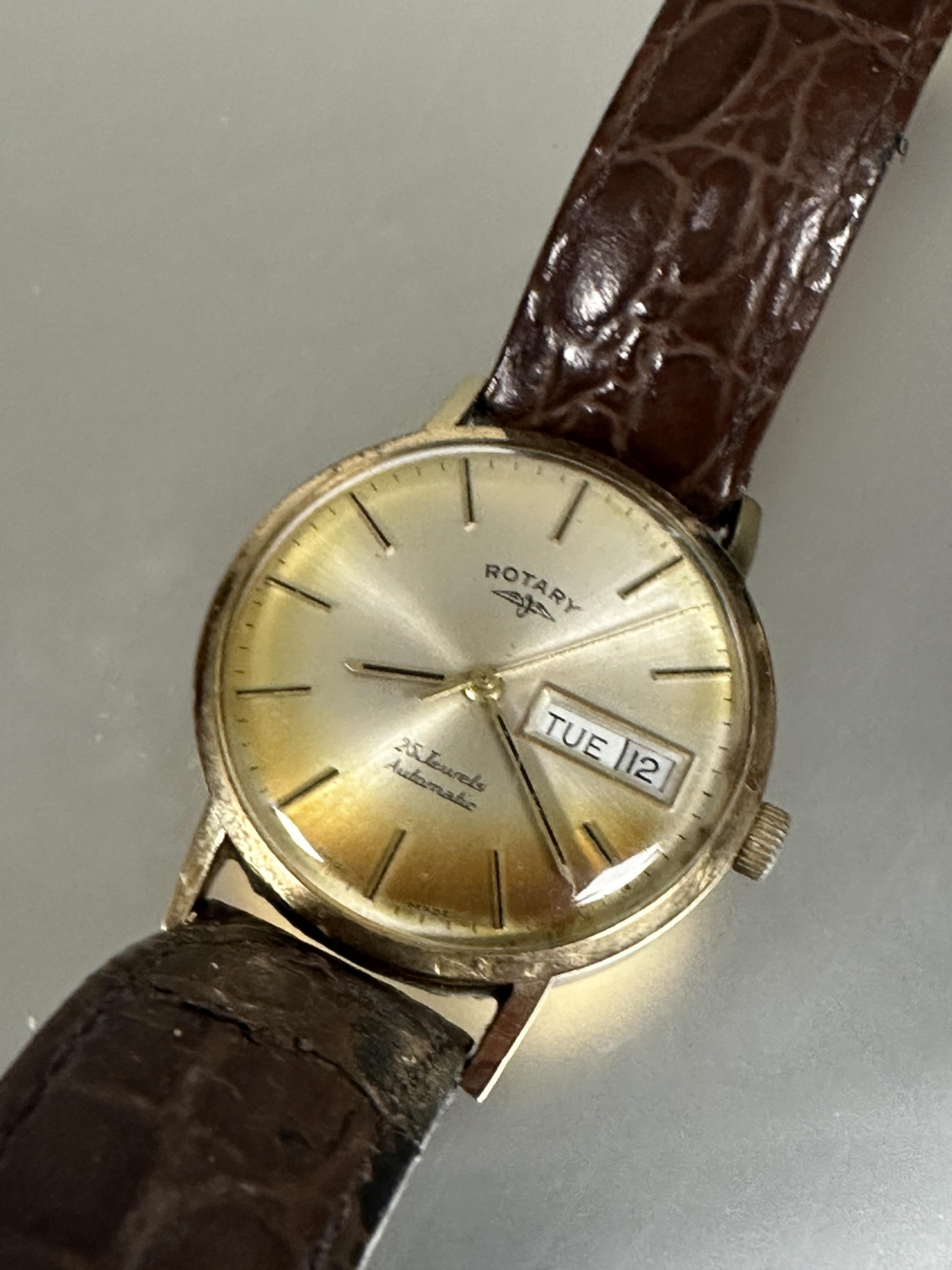 A 9ct gold gents automatic Rotary wrist watch with day and date complication and baton hour - Image 4 of 5