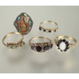 A  9ct gold ring set oval water opal with surround of ten sapphire points all in claw setting O