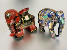 A Indian paper mache Elephant decorated all over with figures in traditional dress in polychrome
