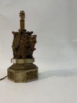 A composition lamp base modelled as an elephant with howdah, on an octagonal base. H37cm.