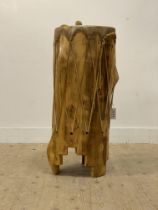 An African style hardwood drum / side table. H96cm.