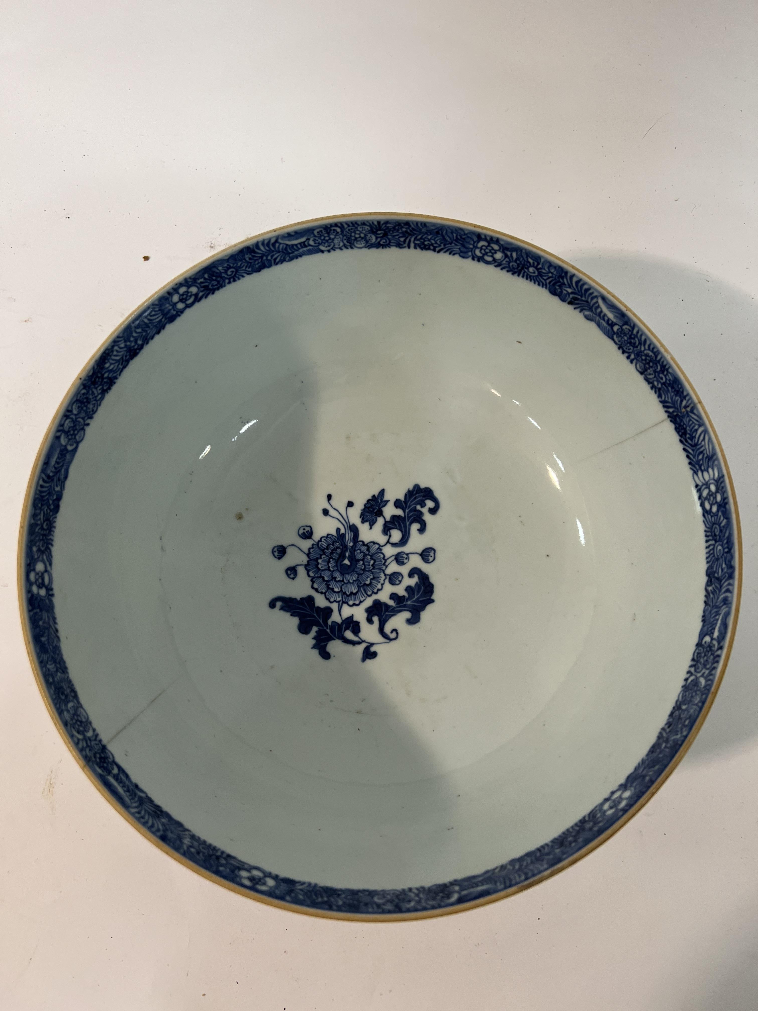 A Chinese blue and white porcelain Qing Dynasty punch bowl decorated with basket of flowers motif ( - Image 2 of 3