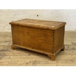 A Victorian pine blanket box, with dovetail joints and raised on bracket supports. H62cm, W105cm,
