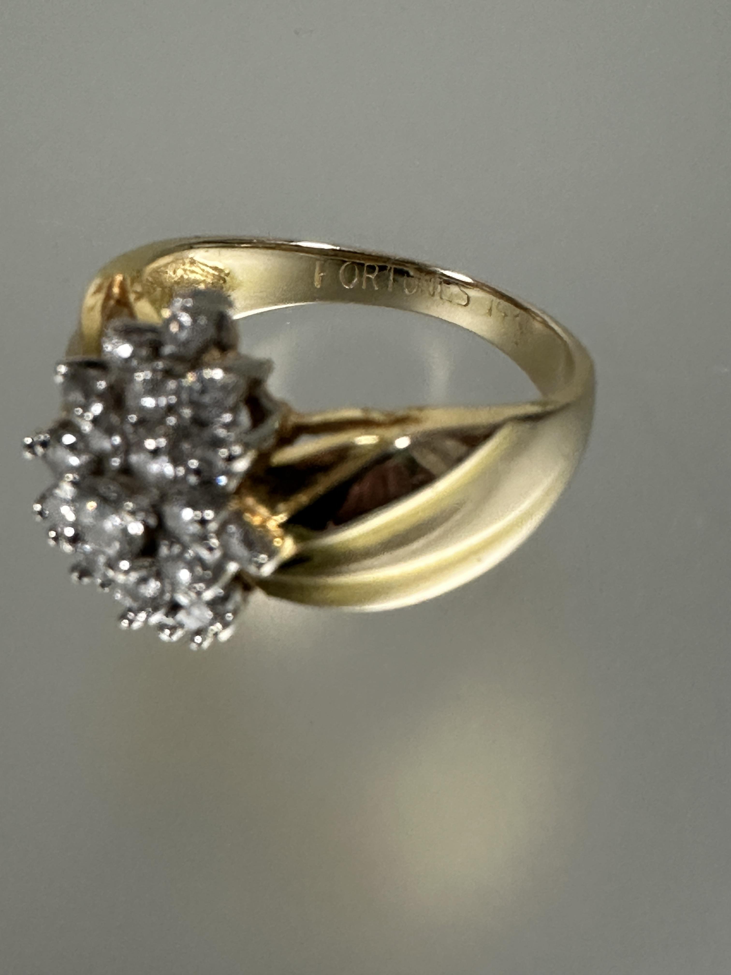 A 14ct gold diamond cluster ring the center brilliant cut stone 0.15ct  within a surround of - Image 5 of 5