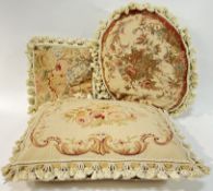 Three vintage tasselled cushions with embroidered designs of floral sprays and roses (oval, square