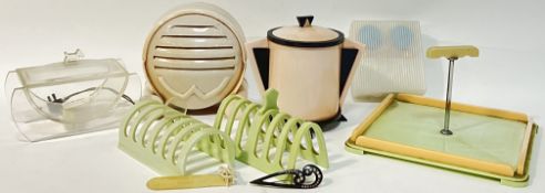 A collection of bakelite/early plastic items, mostly Art Deco style, including a speaker (h-