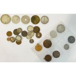 A group of vintage coins comprising several German coins including 1934 Reichsmark, Indian coins,
