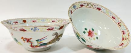 A pair of Chinese enamelled porcelain gilt edge bowls depicting birds, flowers, and phoenixes (