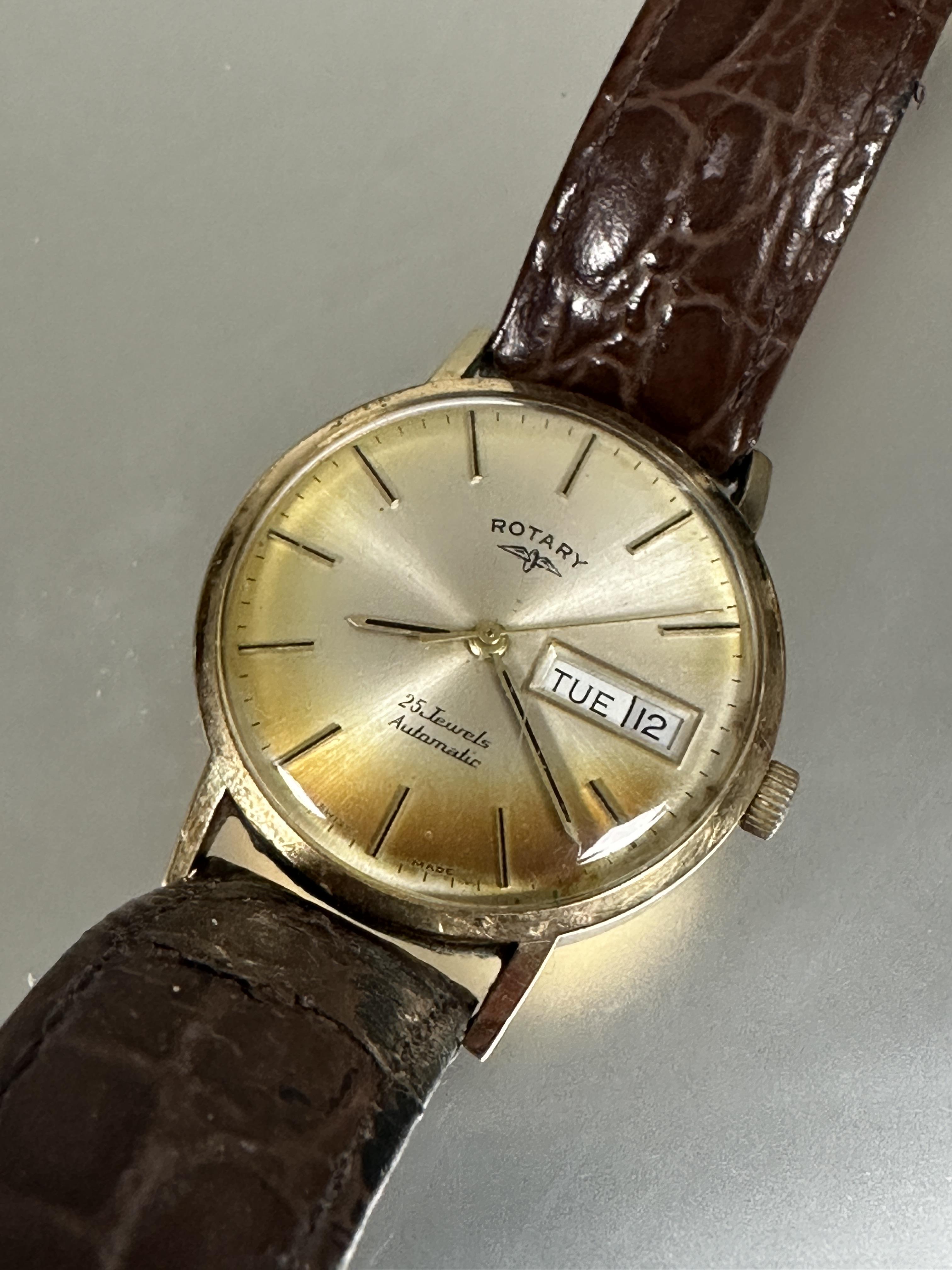 A 9ct gold gents automatic Rotary wrist watch with day and date complication and baton hour - Image 5 of 5