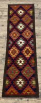 A Maimana kilim runner rug of Geometric design. 217cm x 63cm.