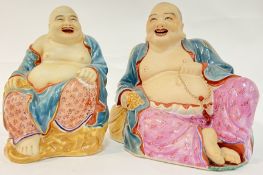 Two Chinese laughing Buddha bisque fired porcelain figures, one seated with gilt shou symbols to