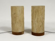 A pair of  hand-made table lamps with textured webbed affect on plastic shades both raised on a