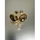 A pair of 9ct gold large Ying and Yang style stud earrings L x 2.5cm, a pair of 9ct gold button