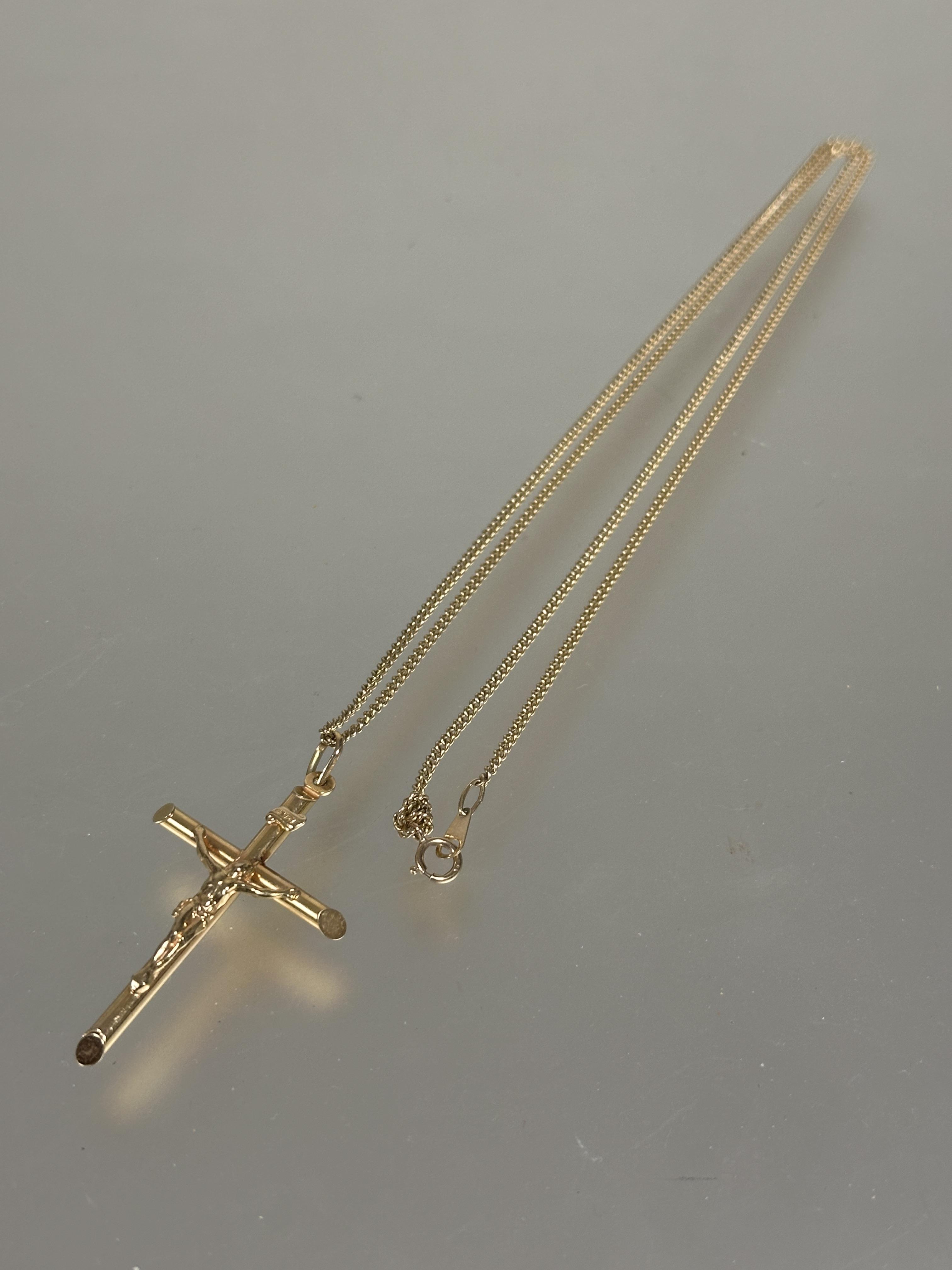 A 9ct gold crucifix with loop to top L x 4.5cm  on 9ct gold cerb link chain L x   30cm 7.84g
