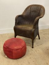 A vintage Lloyd Loom type basketwork chair, together with a red leather pouffe (2)