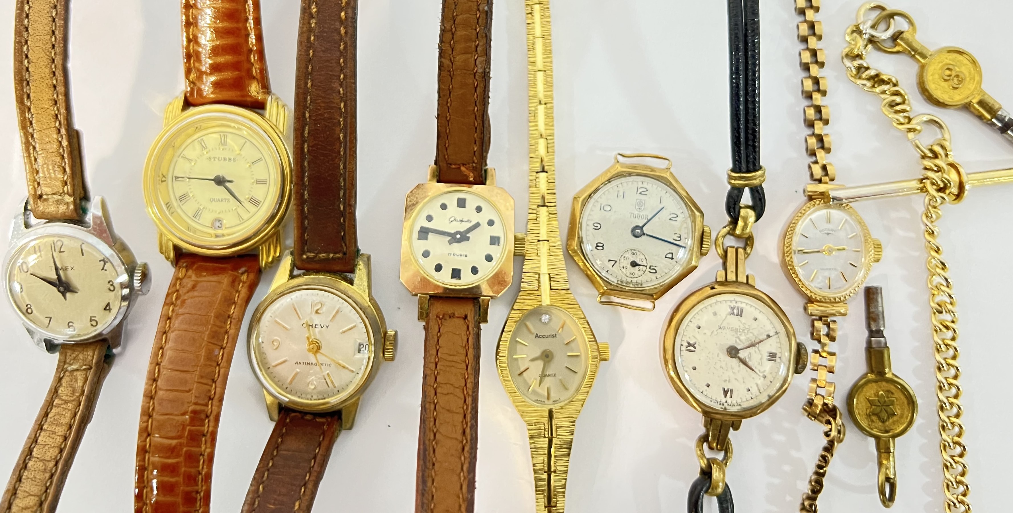 A group of vintage ladies' wristwatches including a 9ct gold cased Tudor with sub seconds dial (case
