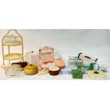 A large group of early plastic items including Art Deco boxes, a cake stand (h- 38cm, w- 20cm),