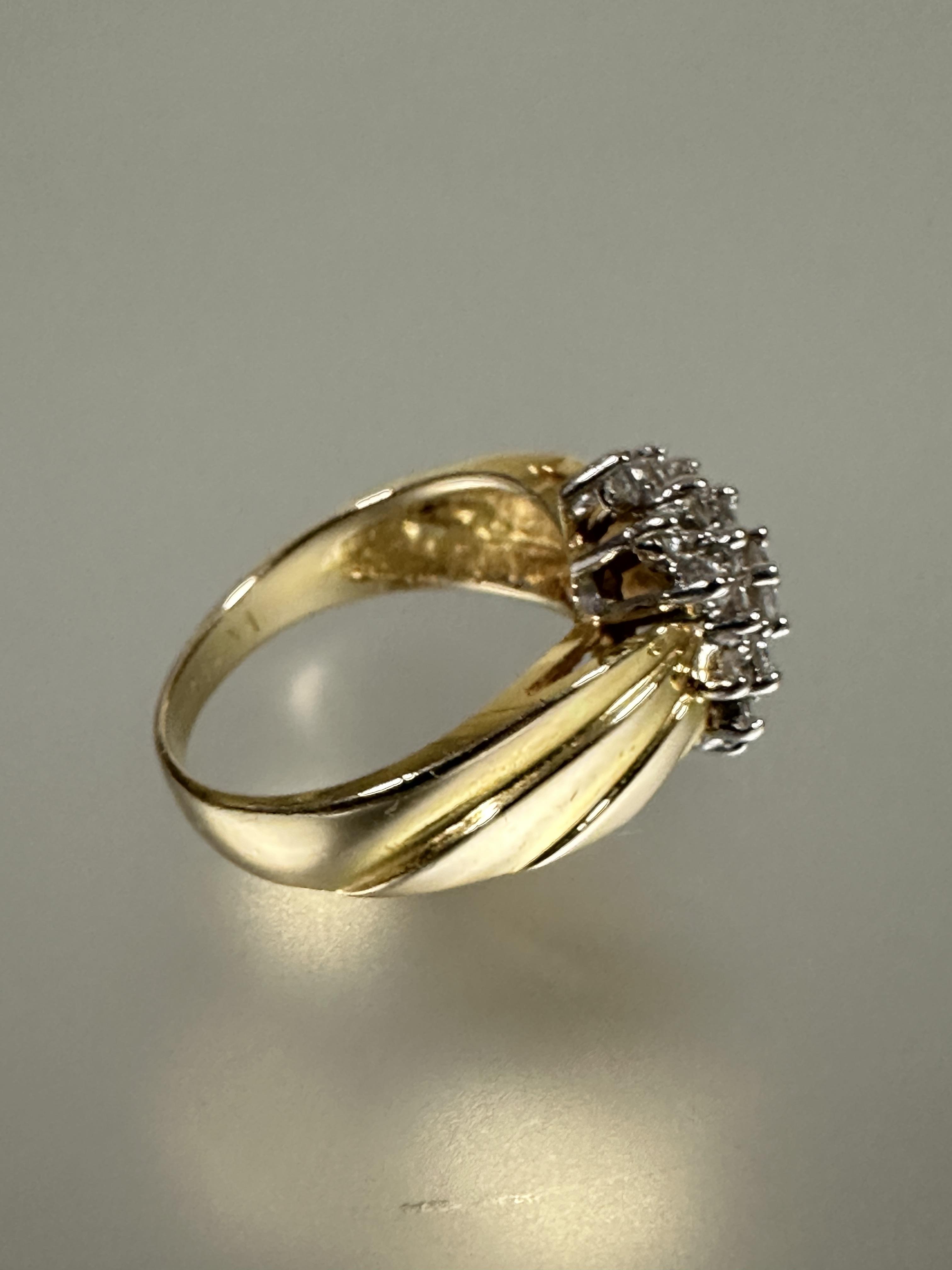 A 14ct gold diamond cluster ring the center brilliant cut stone 0.15ct  within a surround of - Image 3 of 5