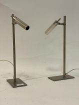A pair of contemporary alminium articulating table lamps by Habitat. H40cm.