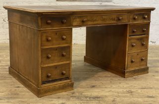 A Edwardian Law office faded mahogany twin pedestal desk desk, the top inset with red skiver,