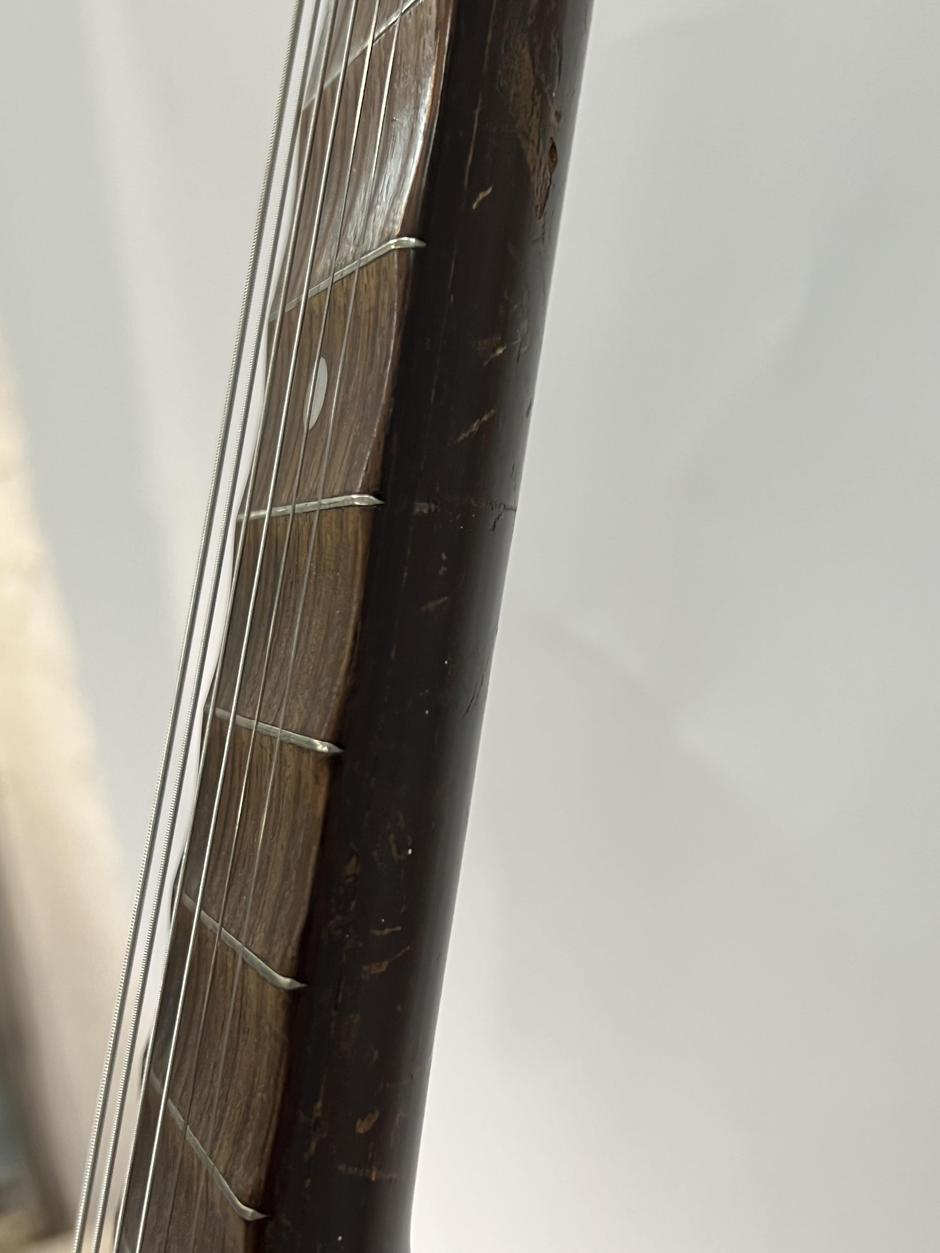 A vintage spruce and rosewood acoustic guitar, the tailpiece marked Dreima, the sound hole with - Image 2 of 6