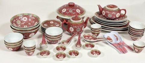 A large collection of Chinese Mun Shou familie rose pink porcelain dinner service comprising, six