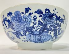 A Chinese blue and white porcelain Qing Dynasty punch bowl decorated with basket of flowers motif (