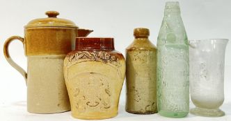 A group of stoneware and salt glazed items comprising a filter jug (h- 23cm, w- 20cm), a salt-glazed