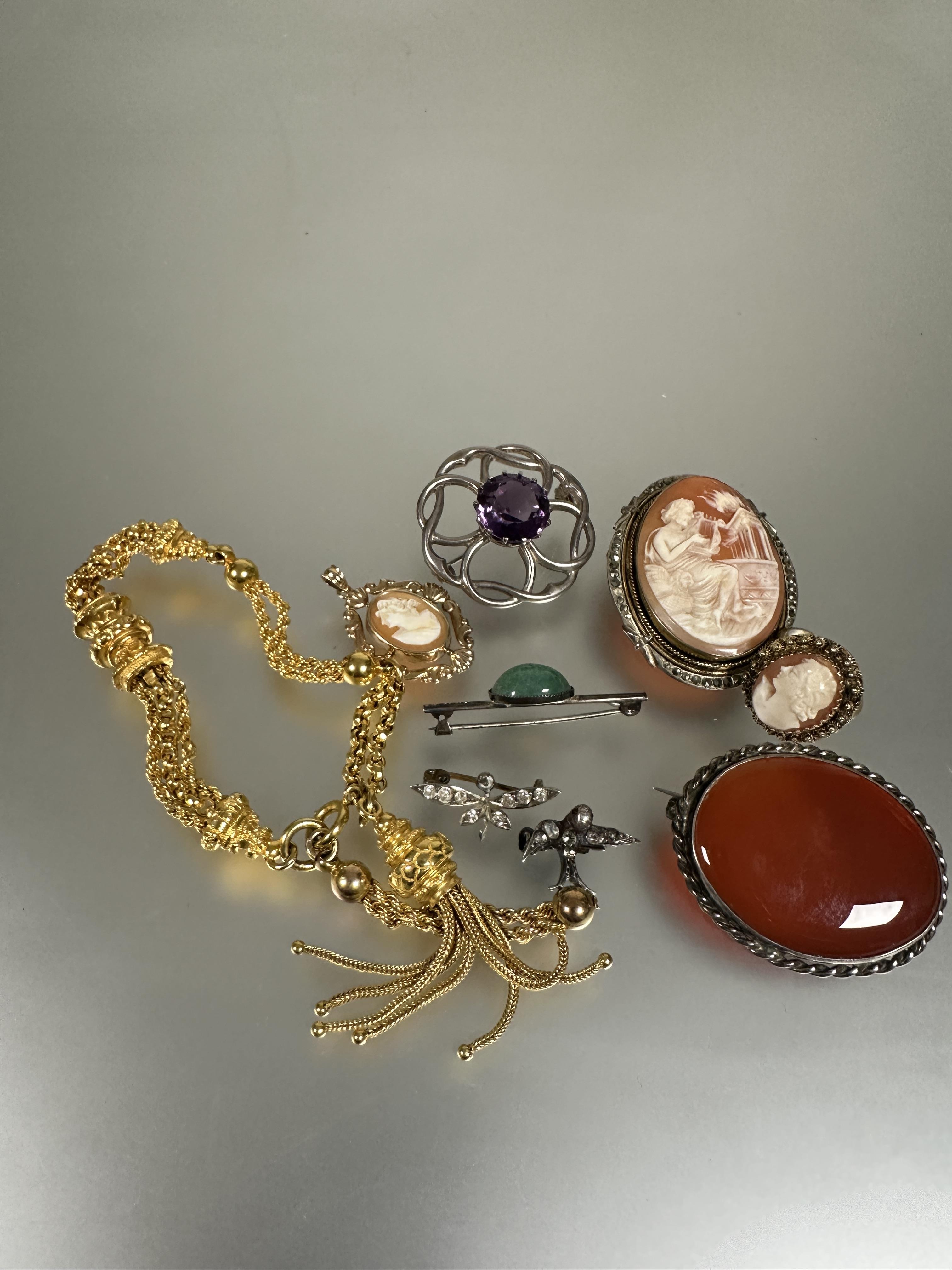 A collection of costume jewellery to include a 9ct gold cameo set oval pendant L x 3cm  2.17g, a