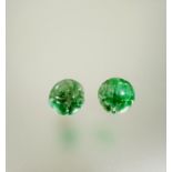 A pair of carved circular celadon jade stud earrings mounted in 18ct white gold D x 1cm 3.52g