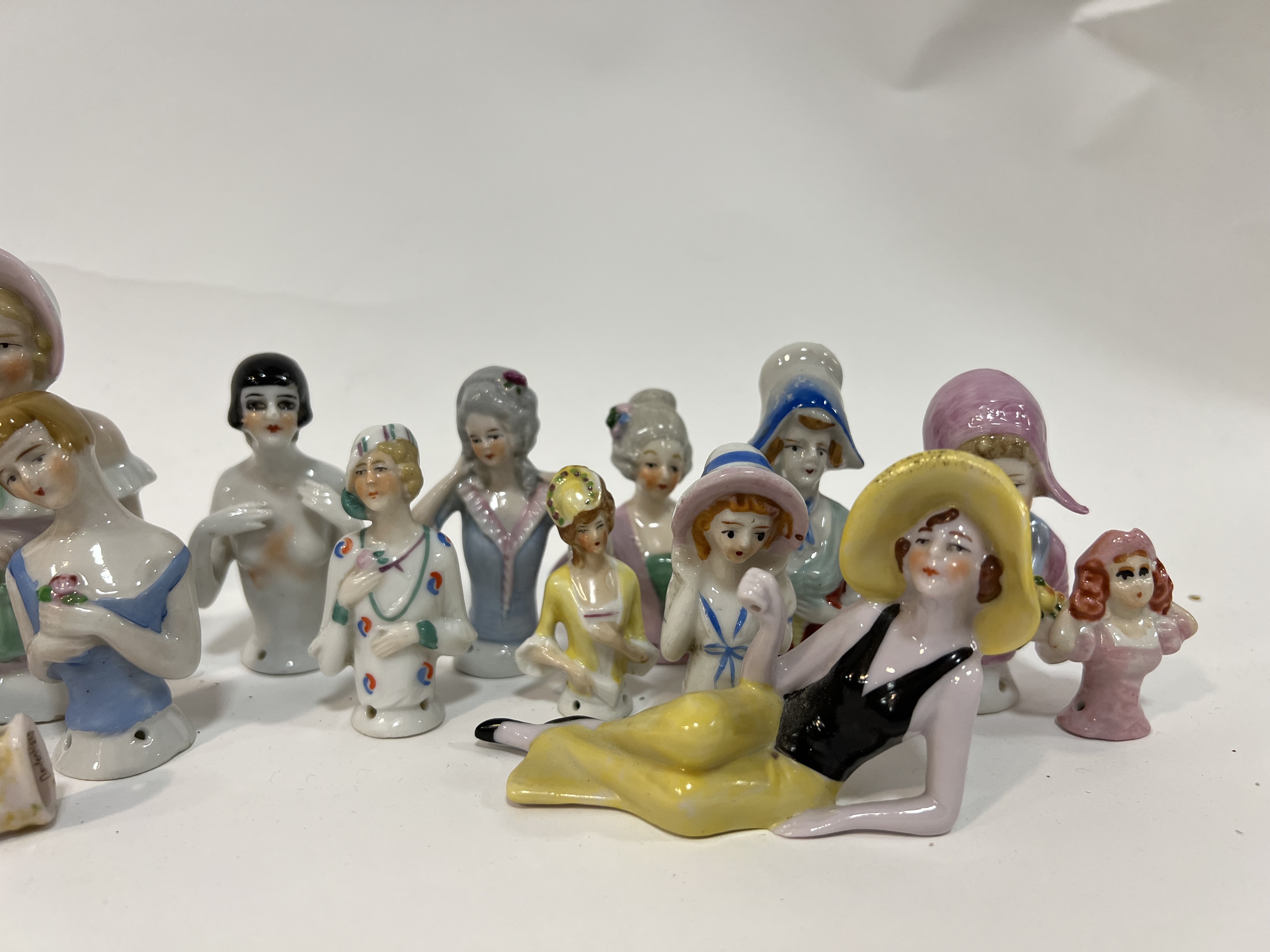 A large quantity of half-doll china lady pin cushions/figures, mostly German, including Art Deco and - Image 2 of 7