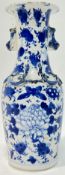 A late Qing Dynasty blue and white porcelain Kangxi revival vase decorated with birds and flowers