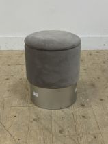 A contemporary dressing table stool of cylindrical form, upholstered in grey velvet. H38cm.