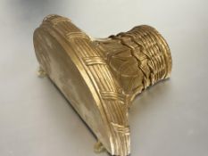 A gilt wood eastern inspired wall bracket of flared shape with lattice and reeded design with