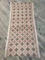An embroidered woollen shawl. 219cm x 103cm.