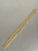 A 9ct gold flat link curb link chain necklace with lobster claw fastening no signs of damage or