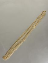 A 9ct gold flat link curb link chain necklace with lobster claw fastening no signs of damage or