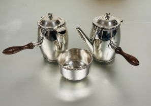 A Sheffield plated three piece part cafe o lait set comprising a barrel shaped hot milk and coffee
