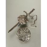 A silver claymore and shield brooch with safety chain L x 8.5cm and a silver circular knot style