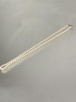 A matched cultured pearl necklace mounted with 9ct gold oval pearl set clasp fastening L x 33cm