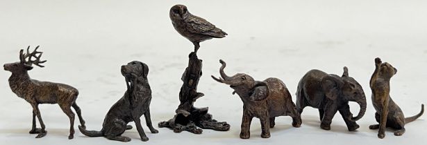A group of Butler and Peach miniature bronze animals comprising elephants, owl etc...
