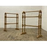 A  pair of early 20th century turned beech towel rails H78cm, L63cm.