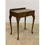 An early 20th century mahogany side table, fitted with a single drawer and raised on cabriole