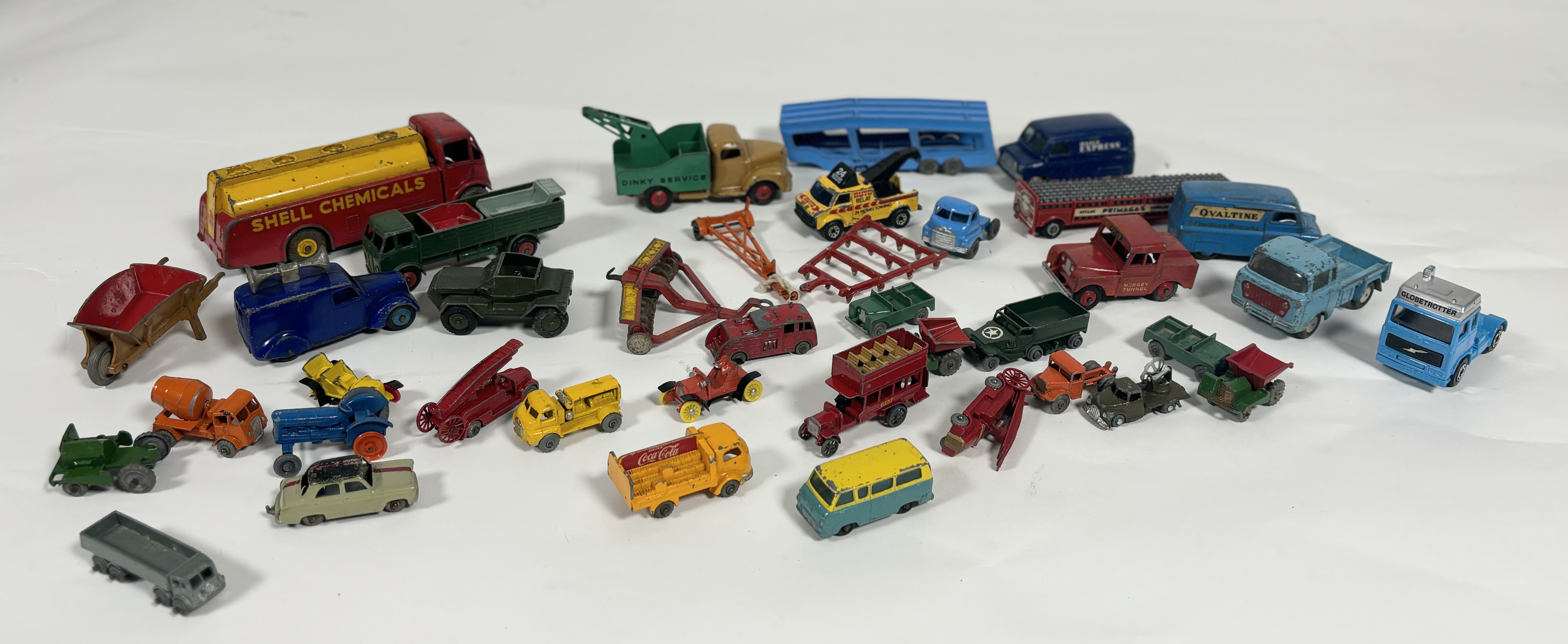 A collection of collectable vintage model cars comprising, a Lesney Coca Cola mustard truck, a Dinky