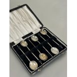 A Edwardian set of six Sheffield silver coffee bean handled coffee spoons in original fitted case
