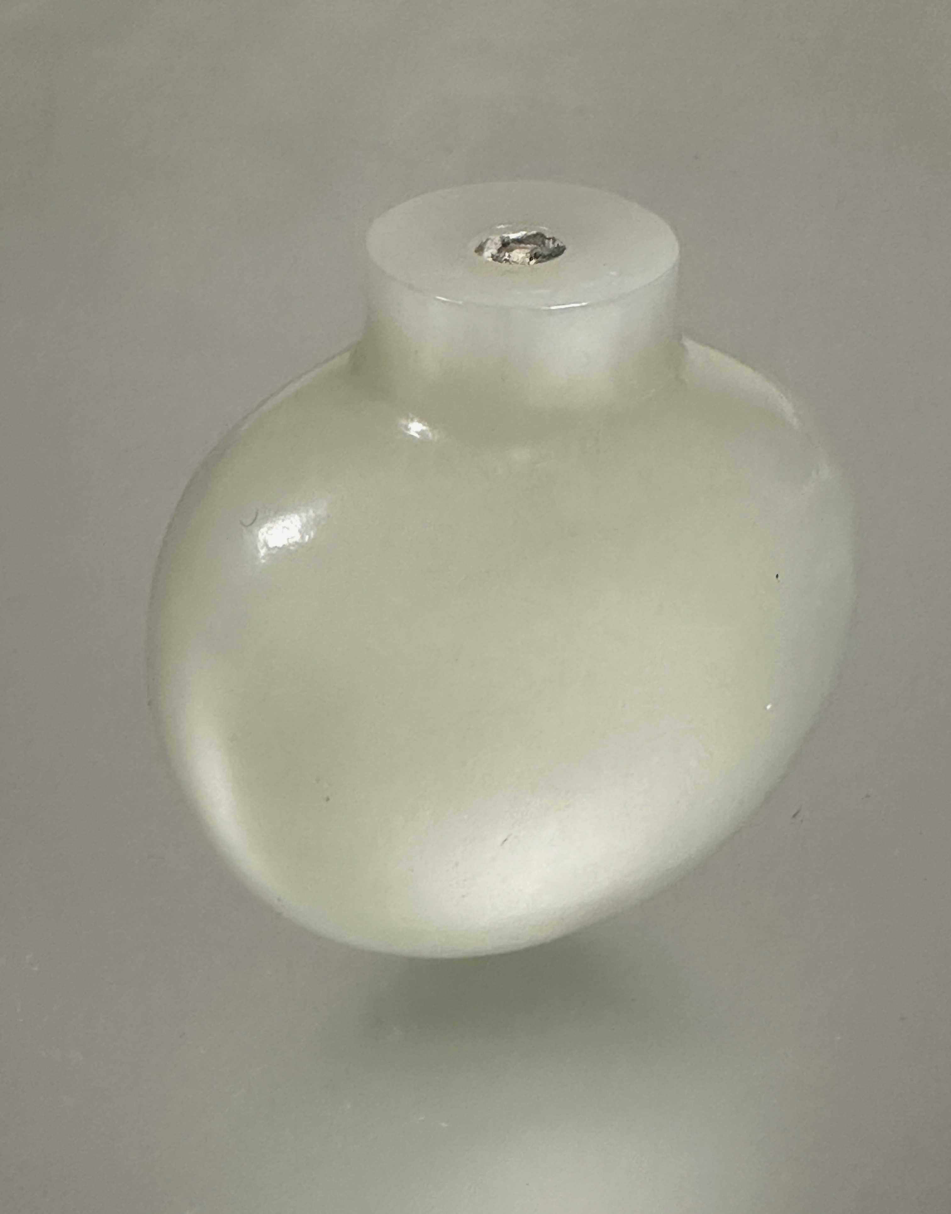 A pale celadon Jade snuff bottle no stopper H x 5.3cm L x 5cm W x 2.2cm