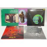 A group of vintage vinyl records comprising several by Nick Drake, John Martyn, Skinty Fia,