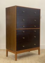 Stag, a vintage walnut and mahogany chest, fitted with six drawers and raised on square section