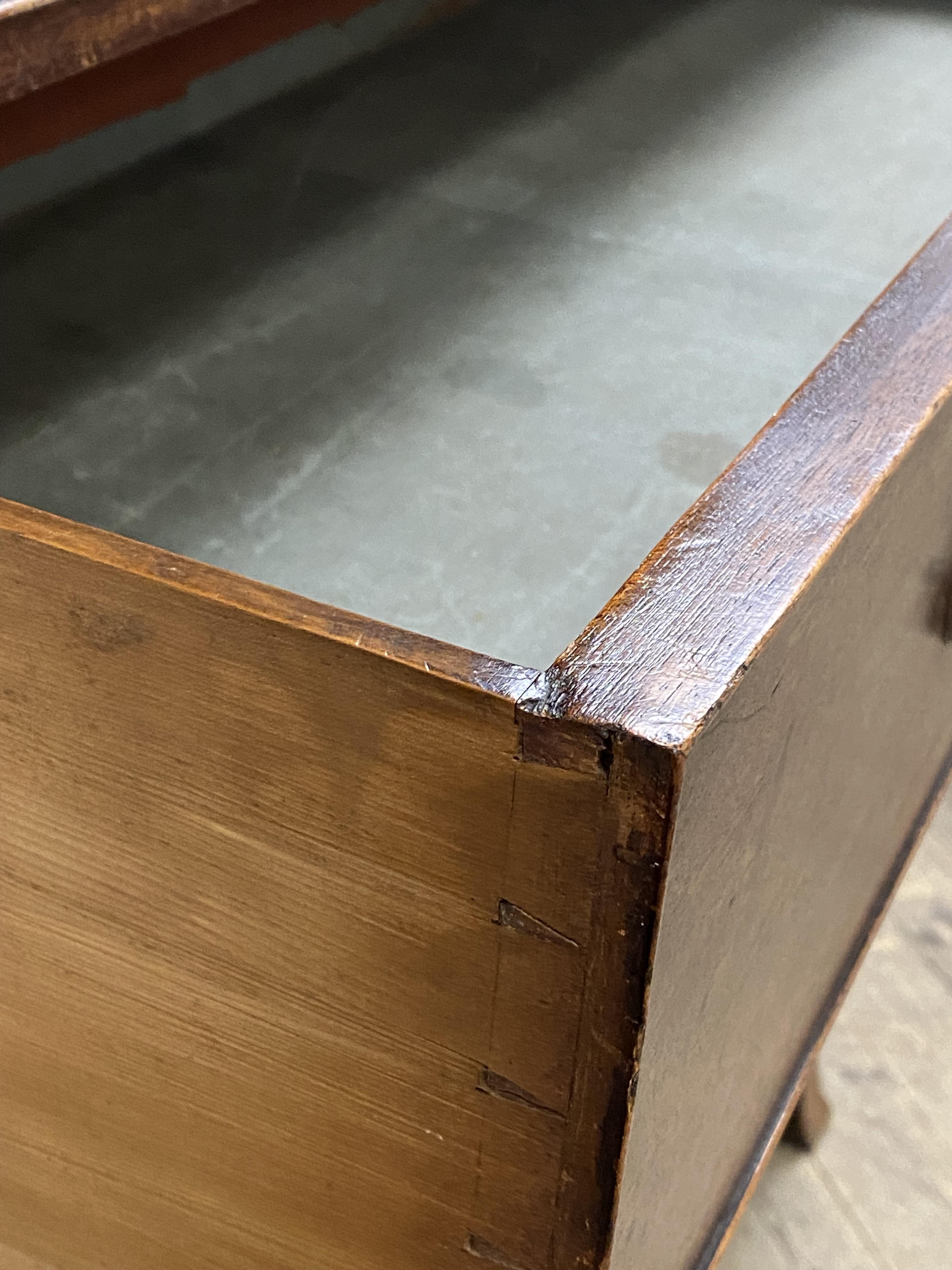 A George III mahogany chest on chest, of squat form, the top section fitted with two short and two - Image 3 of 3